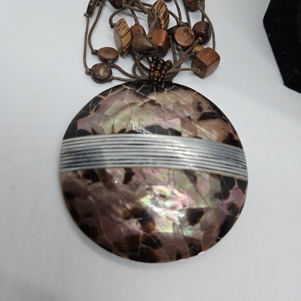 brown cord necklace with wooden beads and large coconut shell inlay pendant - Picture 2 of 3